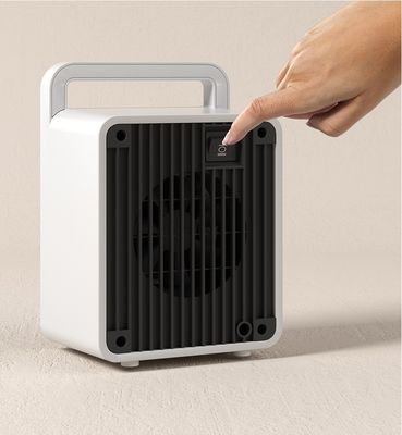 Mini riscaldatore elettrico portatile PTC riscaldamento rapido per la casa ufficio 900W fonte di alimentazione