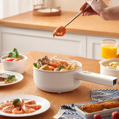 Cucina elettrica multifunzione per fare i noodle domestici e la pentola calda in dormitorio